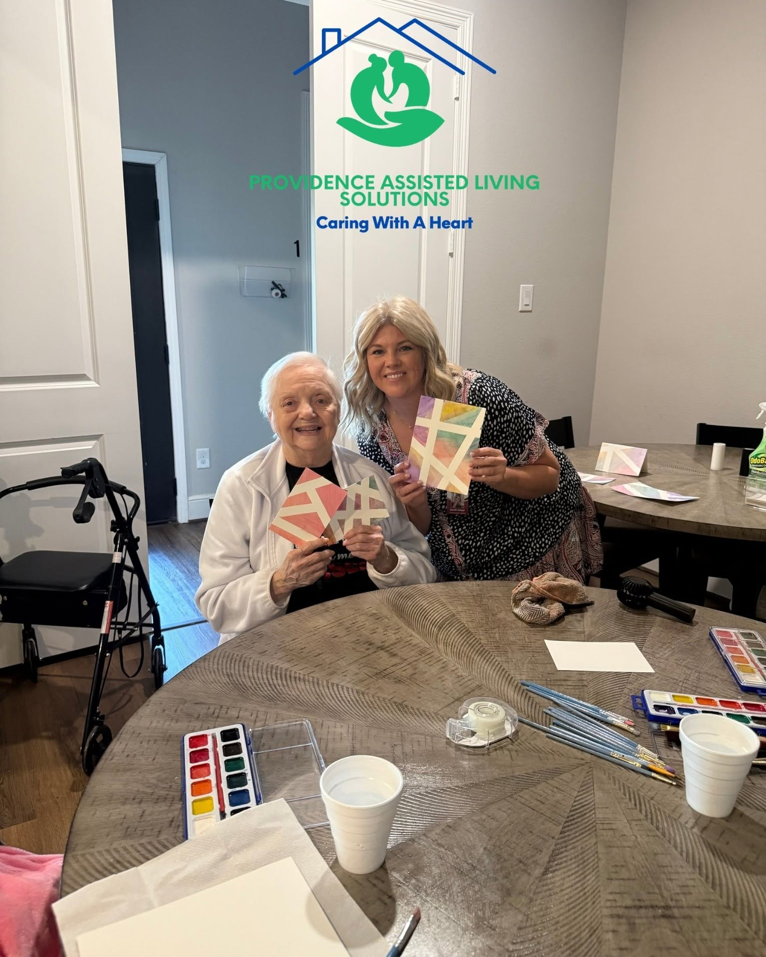 Resident enjoying a creative art activity at Providence Assisted Living Solutions